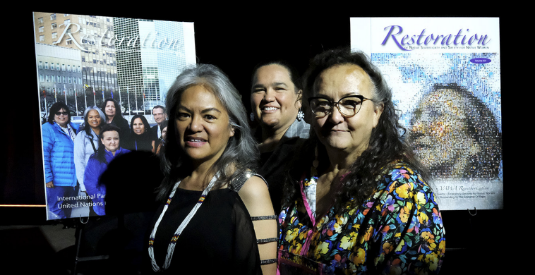 "Paula Julian, Wendy Schlater, and Tami Truett Jerue standing proudly with two previous Restoration Magazine covers. Photo courtesy of NCAI."