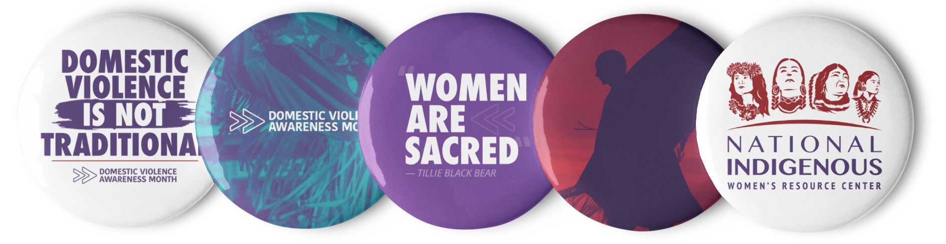 The first button reads: "Domestic Violence Is Not Traditional" with the tagline "Domestic Violence Awareness Month." The second button has a more abstract design with the same tagline: "Domestic Violence Awareness Month." The third button highlights the quote: "Women Are Sacred – Tillie Black Bear." The fourth button features a silhouette of a person wrapped in a shawl. The final button has the logo and name of the National Indigenous Women's Resource Center (NIWRC) with illustrations of Native women.